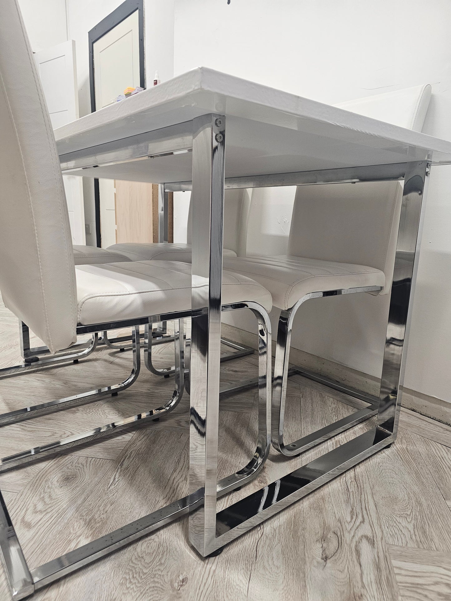Dining Table & 4 Faux Leather Chairs (table has been wrapped)@